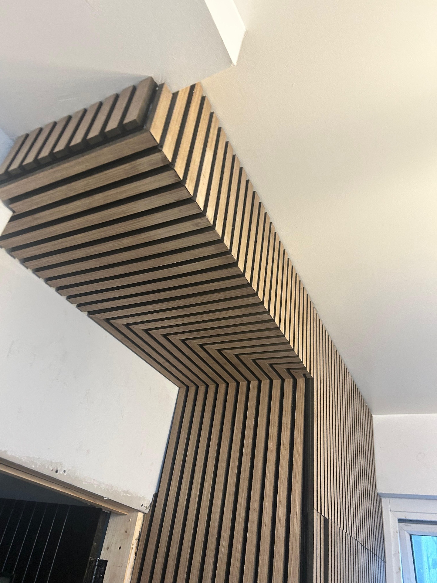 Bespoke oak slat panelling installation